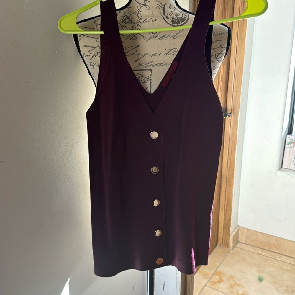 Tank button top